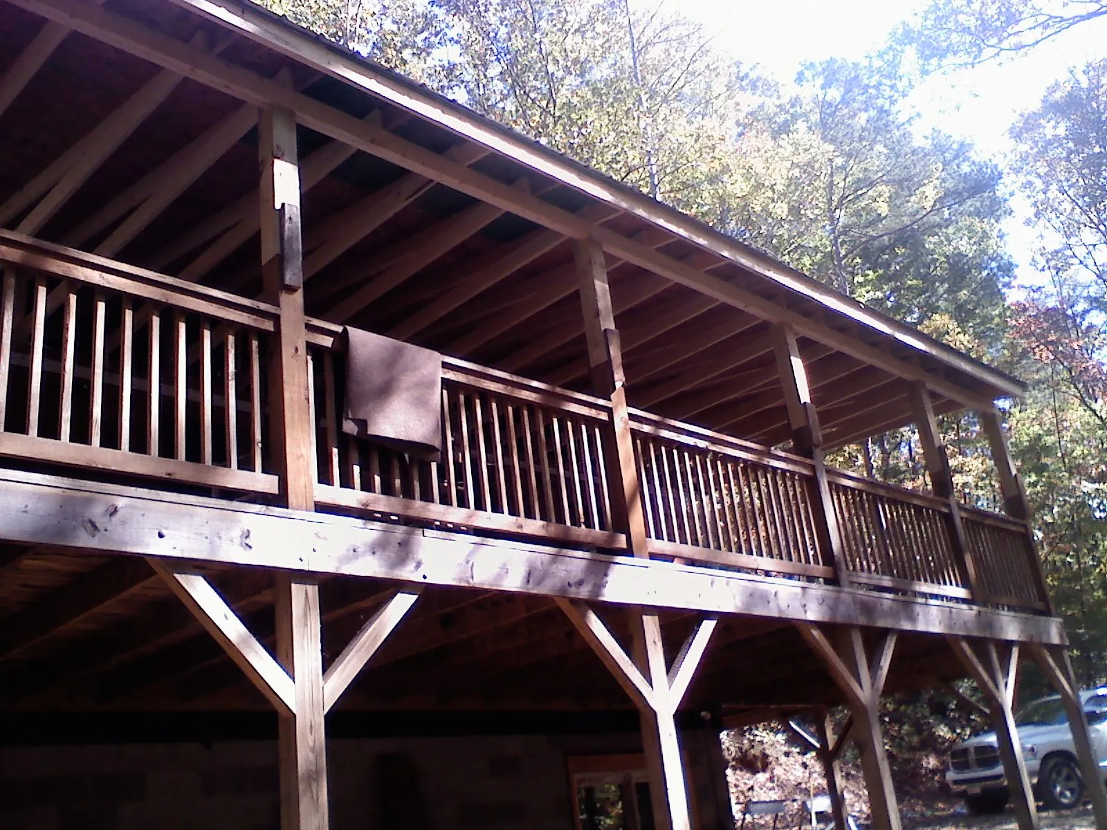 Timber framing under a new elevated porch and deck — Roof Leak Repair in Christmas by Roofing Brothers